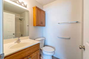 Bathroom with vanity and toilet