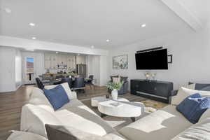 Living room featuring wood finished floors and recessed lighting