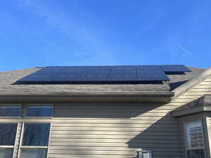 Exterior view of roof with shingles