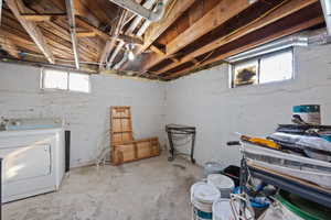 Basement with washer / clothes dryer