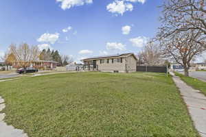 View of property exterior featuring roof mounted solar panels