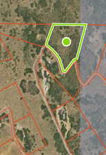 Aerial overview of property's location featuring property boundaries highlighted