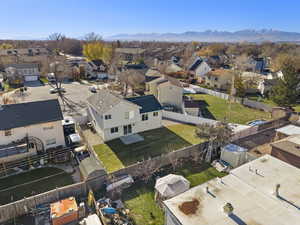 Aerial view of residential area with a mountain backdrop