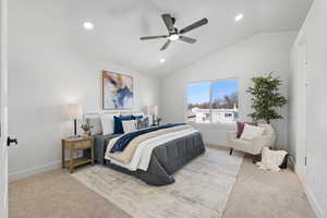 Master Bedroom with vaulted ceiling, ceiling fan, light colored carpet, and recessed lighting
