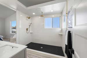 Master Full bath featuring vanity, walk in shower, healthy amount of natural light, and recessed lighting