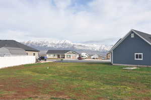 View of yard with a mountain view
