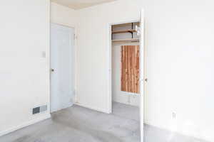 Primary bedroom with ceiling fan