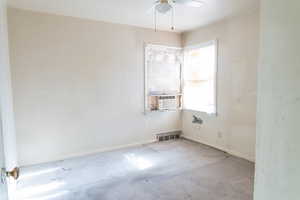Primary bedroom with ceiling fan