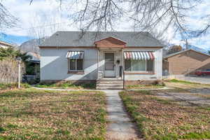 Bungalow-style home featuring a newer shingled roof