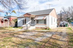 Bungalow-style home featuring a newer shingled roof