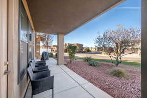 Porch with a residential view and grilling area