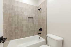 Full bathroom with bathtub / shower combination and toilet