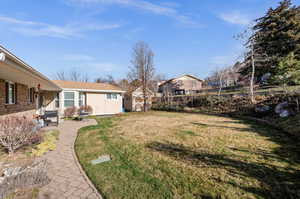 View of yard with a patio