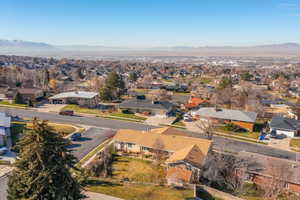 Aerial view of residential area with a mountain backdrop