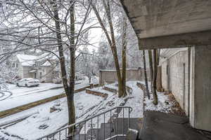 View of yard layered in snow