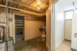 Below grade area with a heating unit