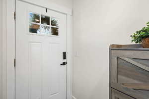 Entryway featuring baseboards