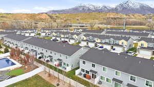 Aerial view of residential area with a mountain backdrop