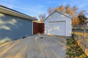 Detached garage with driveway