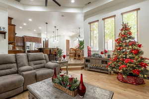 Living area featuring recessed lighting, light wood-style floors, and ceiling fan