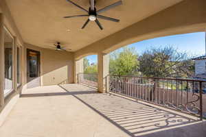View of patio featuring a ceiling fan