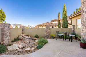 View of patio / terrace with outdoor dining area and a residential view