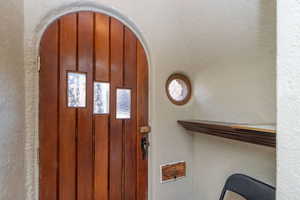 Detailed view of a textured wall and arched walkways