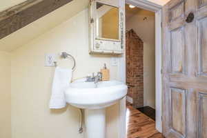 Bathroom with wood finished floors