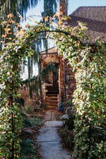 Property entrance featuring a chimney