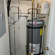 Utilities with secured water heater and electric panel