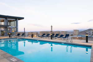 Community pool featuring a patio area