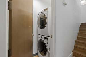 Washroom featuring estacked washer and dryer