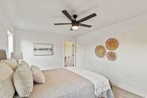 Bedroom with carpet flooring and ceiling fan