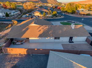 Aerial perspective of suburban area featuring a mountainous background