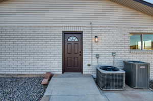 Property entrance with brick siding