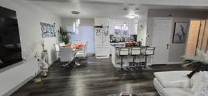 Living area featuring dark wood finished floors