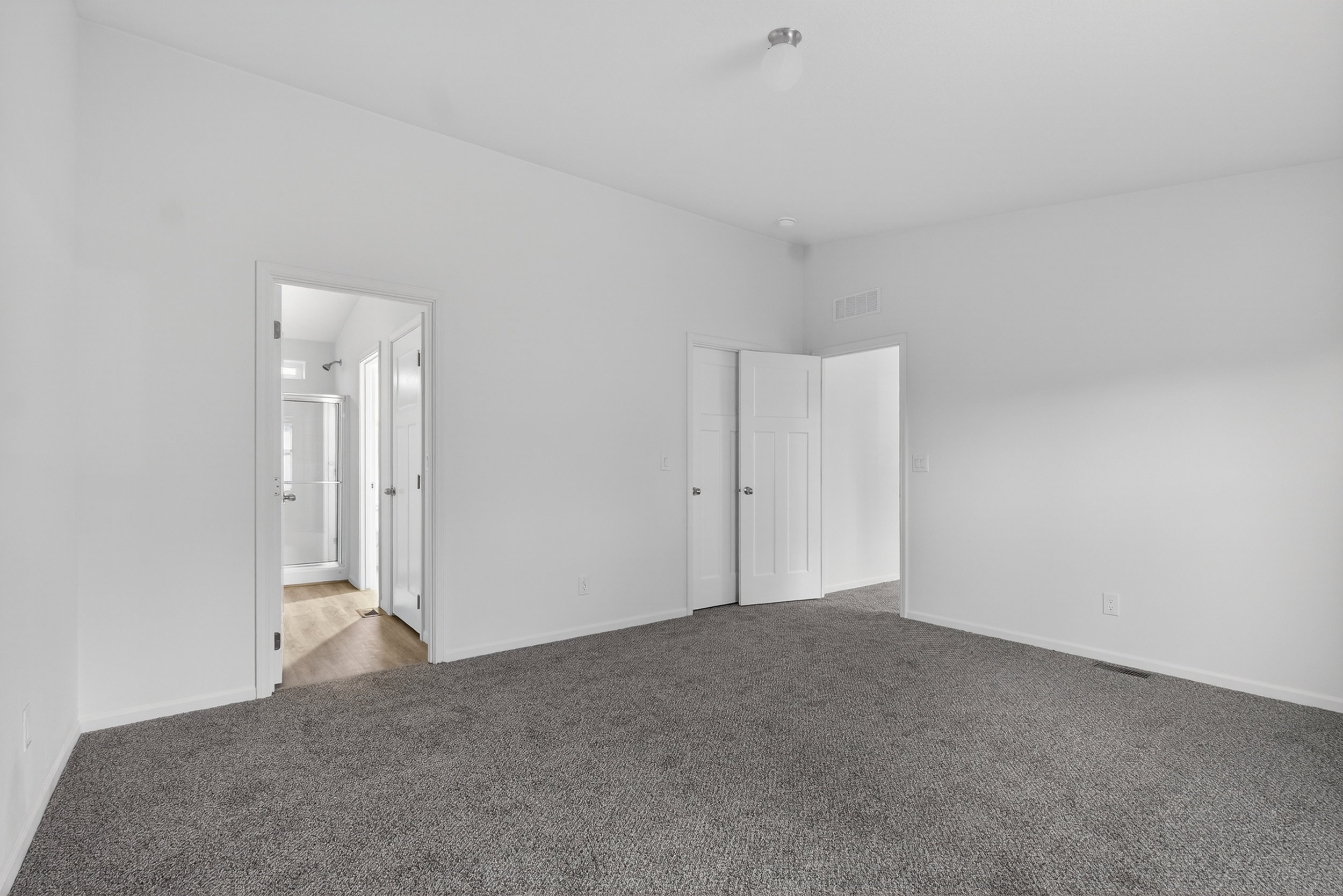 Unfurnished room featuring carpet flooring and baseboards