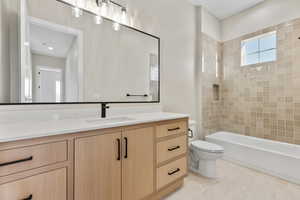 Full bathroom featuring vanity and bathing tub / shower combination