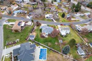 Aerial overview of property's location featuring nearby suburban area