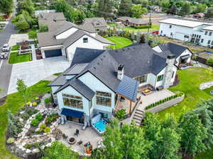 Aerial perspective of suburban area with a pool area