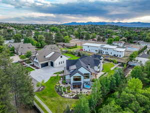 Aerial view of residential area featuring a mountain backdrop