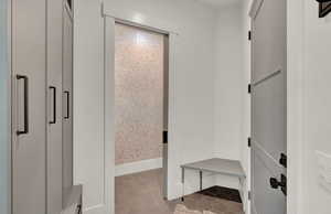 Mudroom featuring light tile patterned flooring