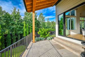 Balcony with view of scattered trees