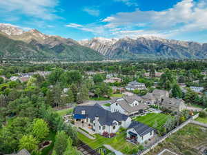 Aerial view of residential area featuring a mountain backdrop