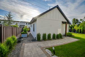View of side of home featuring board and batten siding