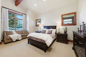 Bedroom with light carpet and recessed lighting