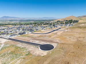 Aerial view of residential area featuring a mountain backdrop
