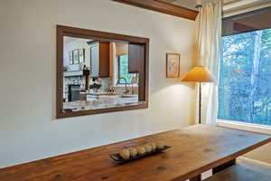 Office view of tasteful backsplash and stainless steel dishwasher