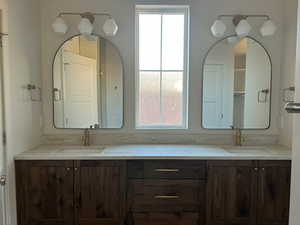 Full bathroom with double vanity