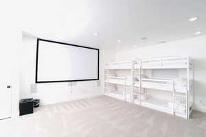 Carpeted cinema room featuring recessed lighting